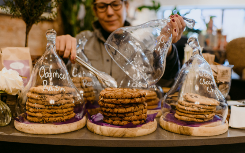 Woman serving cookies